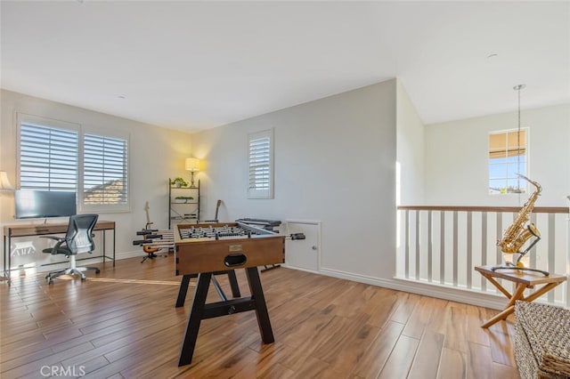24923 Hearth Ct, Valencia, CA 91354 - playroom featuring an office area, wood finished floors, and healthy amount of natural light