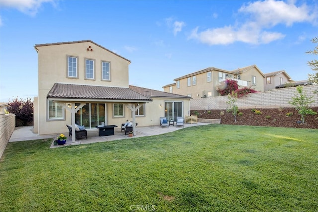 24923 Hearth Ct, Valencia, CA 91354 - back of house featuring stucco siding, a patio area, and a tiled roof