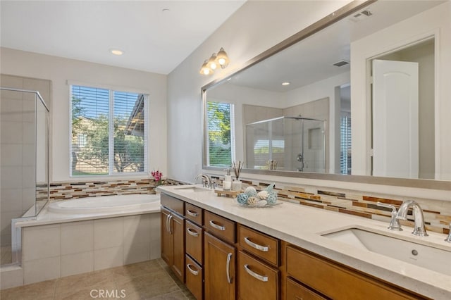 24923 Hearth Ct, Valencia, CA 91354 - bathroom featuring a stall shower, double vanity, healthy amount of natural light, and a bath