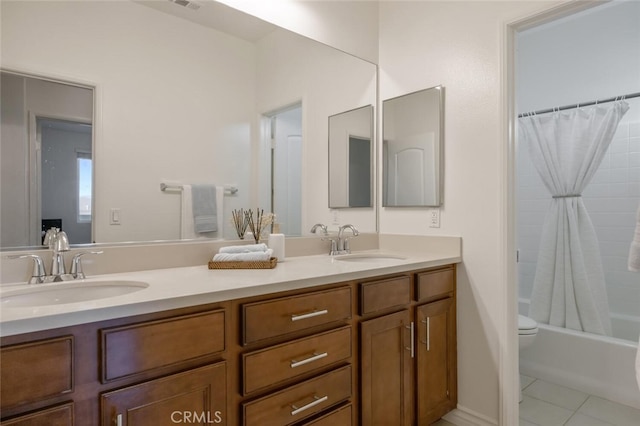 24923 Hearth Ct, Valencia, CA 91354 - full bath with double vanity, shower / tub combo, and tile patterned floors