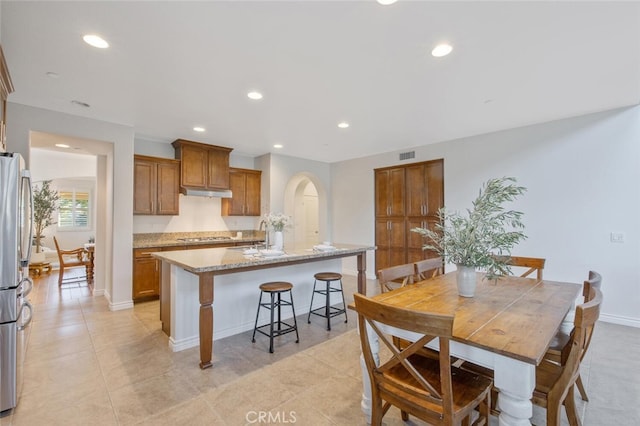 24923 Hearth Ct, Valencia, CA 91354 - dining room featuring recessed lighting and arched walkways