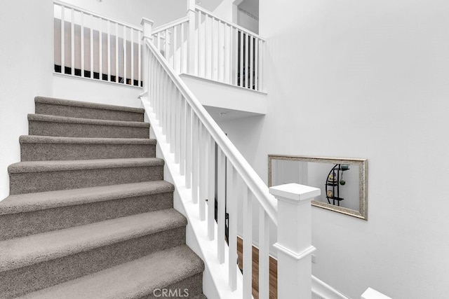 30536 Astoria Ln, Murrieta, CA 92563 - staircase featuring wood finished floors and baseboards