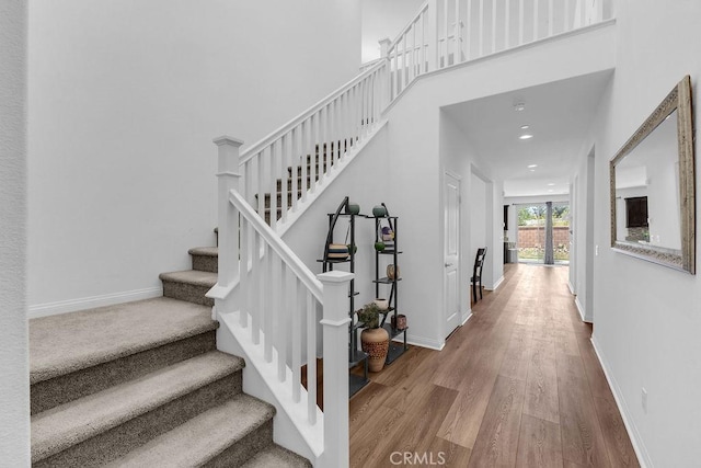 30536 Astoria Ln, Murrieta, CA 92563 - stairway featuring wood finished floors, baseboards, and recessed lighting