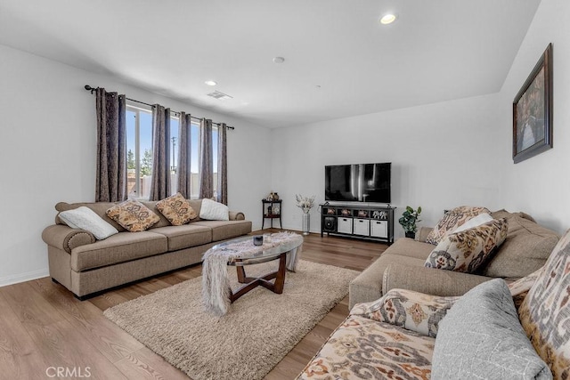 30536 Astoria Ln, Murrieta, CA 92563 - living room with wood finished floors, baseboards, and recessed lighting