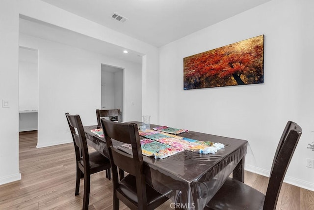 30536 Astoria Ln, Murrieta, CA 92563 - dining space featuring wood finished floors, baseboards, and recessed lighting