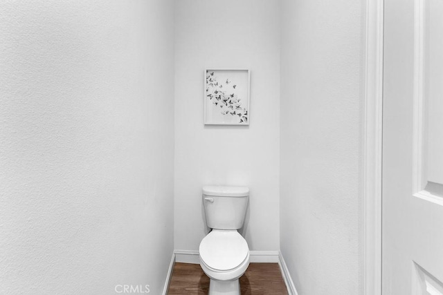 30536 Astoria Ln, Murrieta, CA 92563 - bathroom featuring baseboards, wood finished floors, and toilet