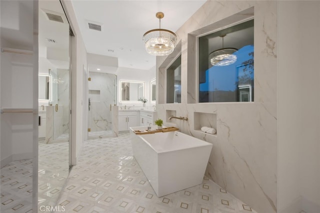 23835 Bella Vista Dr, Newhall, CA 91321 - full bath featuring a chandelier, a marble finish shower, vanity, a freestanding tub, and tile walls