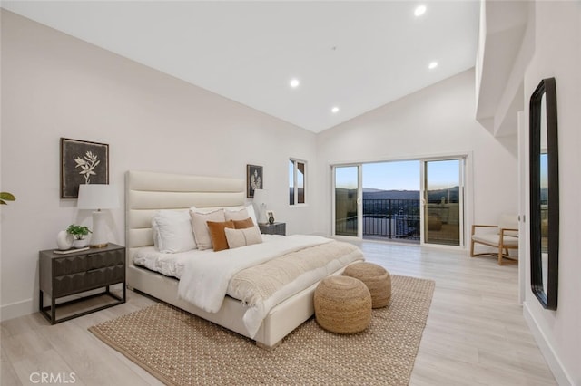 23835 Bella Vista Dr, Newhall, CA 91321 - bedroom with access to exterior, light wood finished floors, recessed lighting, and high vaulted ceiling