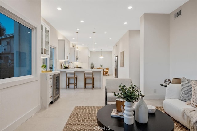 23835 Bella Vista Dr, Newhall, CA 91321 - living area with beverage cooler, recessed lighting, and baseboards