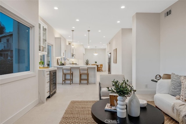 23835 Bella Vista Dr, Newhall, CA 91321 - living area with wine cooler and recessed lighting