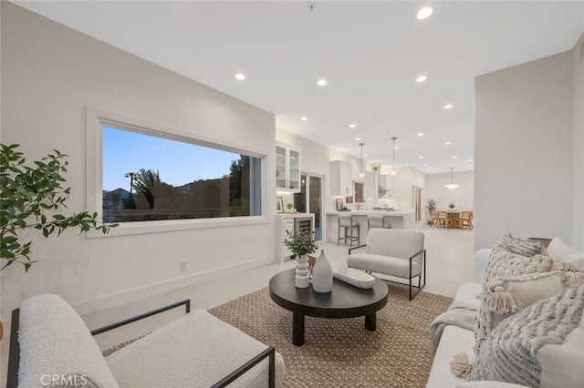 23835 Bella Vista Dr, Newhall, CA 91321 - living area featuring recessed lighting, light carpet, and beverage cooler