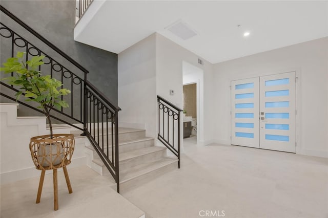 23835 Bella Vista Dr, Newhall, CA 91321 - entryway featuring stairway and french doors