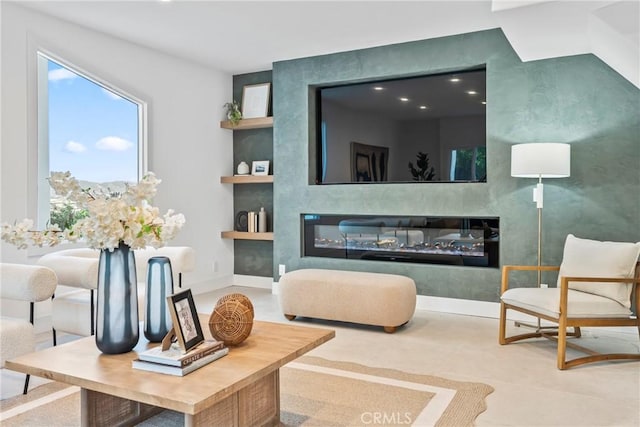 23835 Bella Vista Dr, Newhall, CA 91321 - living room featuring built in features, a glass covered fireplace, and recessed lighting