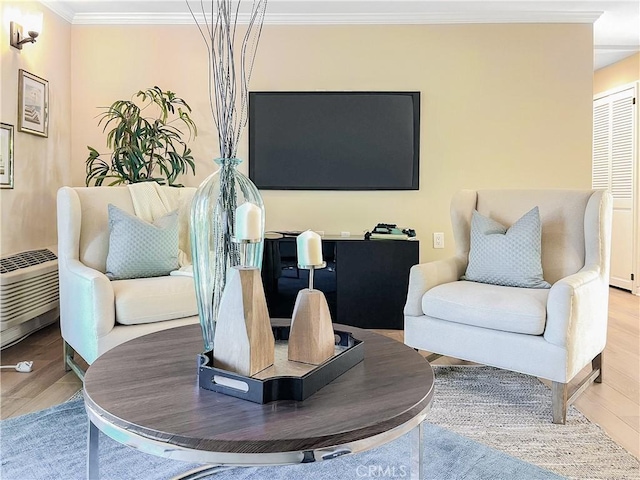 3438 Bahia Blanca W Unit B, Laguna Woods, CA 92637 - living room featuring wood finished floors and crown molding