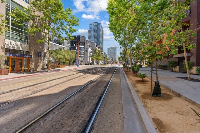 1225 Island Ave Unit 503, San Diego, CA 92101 - view of asphalt road featuring a view of city, curbs, sidewalks, and street lighting