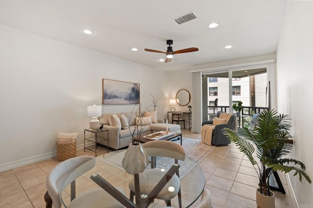 1225 Island Ave Unit 503, San Diego, CA 92101 - living room with light tile patterned floors, recessed lighting, a ceiling fan, and baseboards