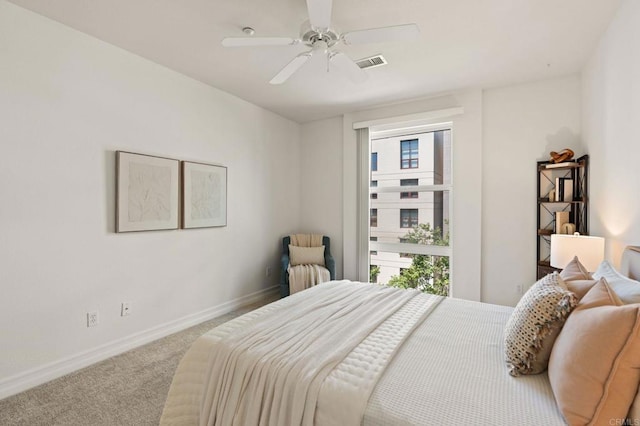 1225 Island Ave Unit 503, San Diego, CA 92101 - bedroom featuring baseboards, carpet, and ceiling fan