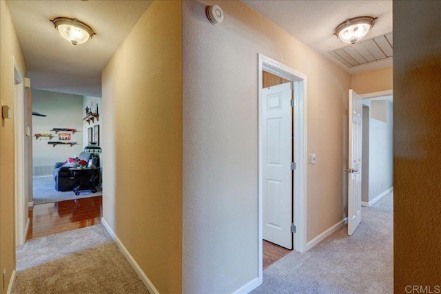 221 E Old Julian Hwy, Ramona, CA 92065 - corridor featuring light carpet and baseboards