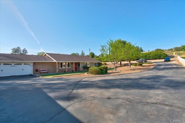 221 E Old Julian Hwy, Ramona, CA 92065 - ranch-style home with driveway and an attached garage