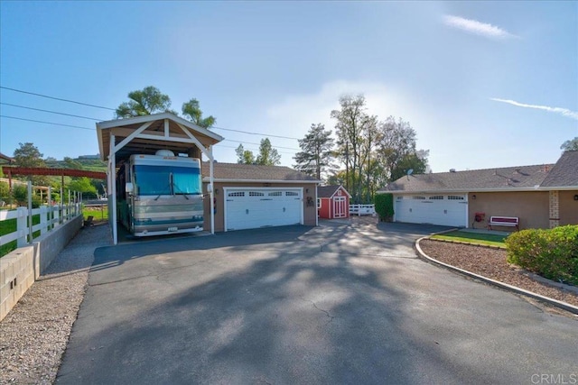 221 E Old Julian Hwy, Ramona, CA 92065 - view of front of property with a detached garage and an outbuilding