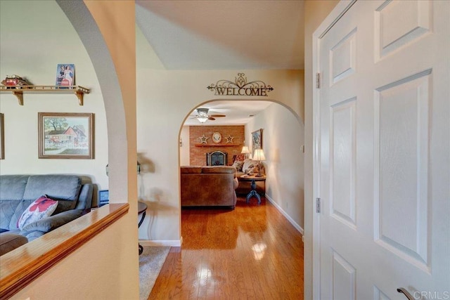 221 E Old Julian Hwy, Ramona, CA 92065 - hall with arched walkways, hardwood / wood-style flooring, and baseboards