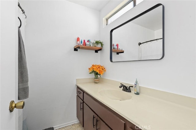12518 Bernadette St, Pacoima, CA 91331 - bathroom featuring vanity and baseboards