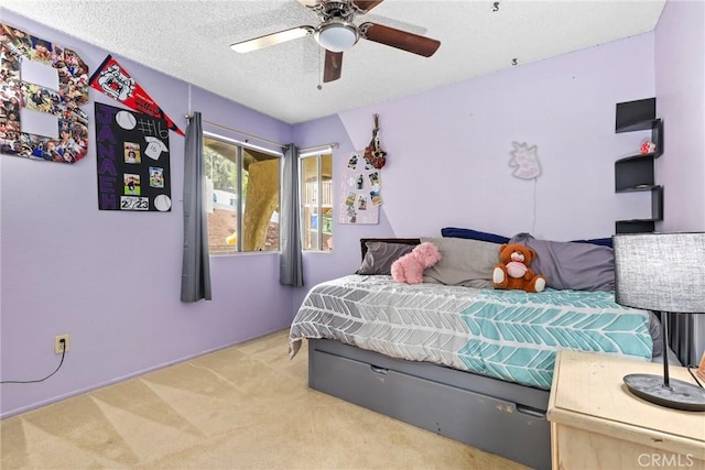12518 Bernadette St, Pacoima, CA 91331 - carpeted bedroom with a textured ceiling and ceiling fan