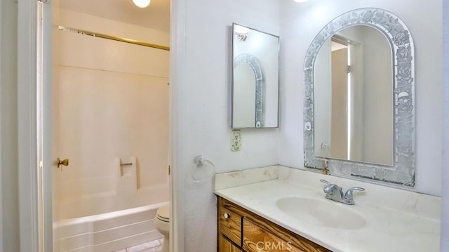 8471 Evergreen, Garden Grove, CA 92841 - bathroom featuring toilet, vanity, and tub / shower combination