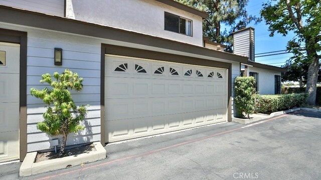 8471 Evergreen, Garden Grove, CA 92841 - garage featuring driveway