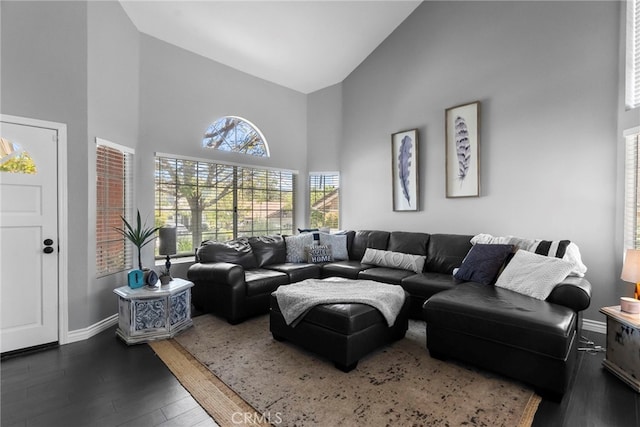 22565 Pecan Pl, Saugus, CA 91390 - living area with high vaulted ceiling, wood finished floors, and baseboards