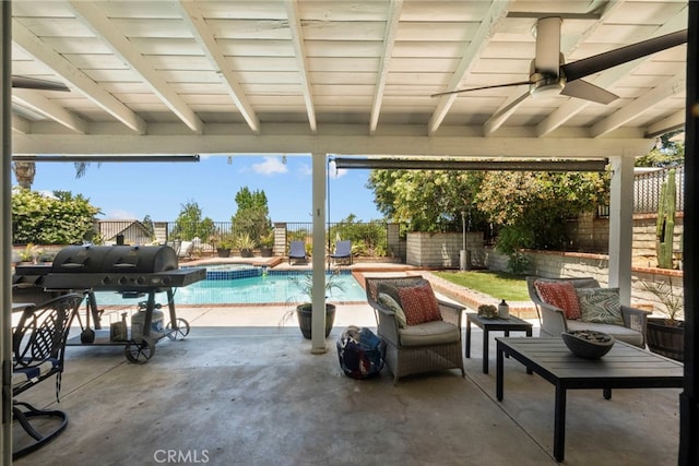 22565 Pecan Pl, Saugus, CA 91390 - fenced backyard with a patio, ceiling fan, area for grilling, and a pool with connected hot tub