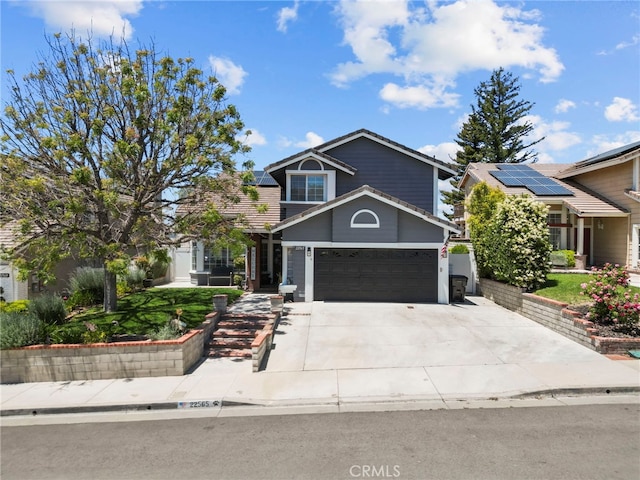 22565 Pecan Pl, Saugus, CA 91390 - view of front of house with concrete driveway and a garage
