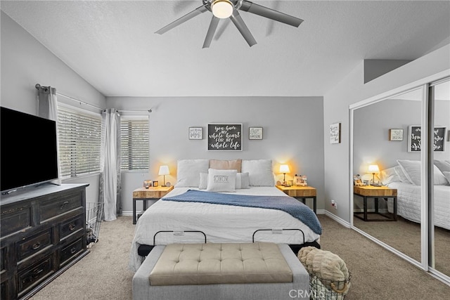 22565 Pecan Pl, Saugus, CA 91390 - carpeted bedroom featuring lofted ceiling, a textured ceiling, a ceiling fan, and baseboards