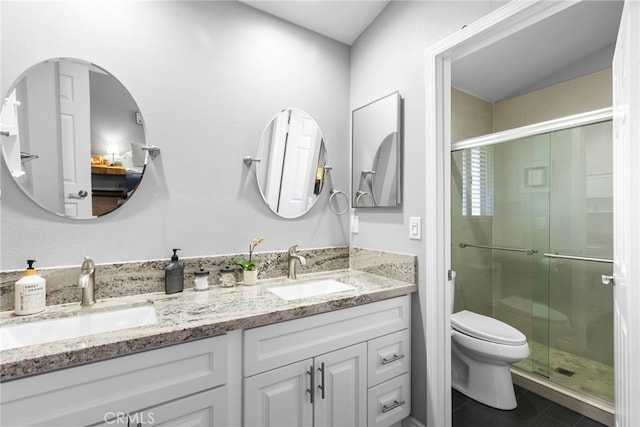 22565 Pecan Pl, Saugus, CA 91390 - bathroom featuring double vanity, a shower stall, and toilet