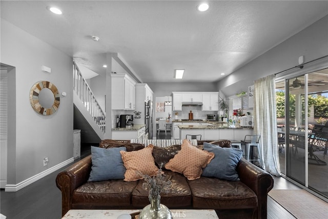 22565 Pecan Pl, Saugus, CA 91390 - living area with light wood-style floors, stairway, baseboards, and recessed lighting