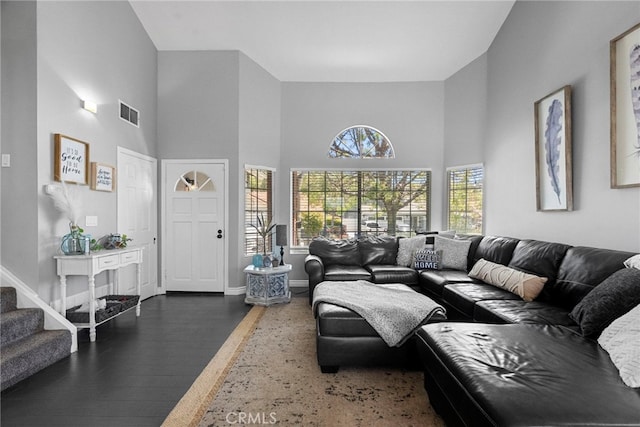 22565 Pecan Pl, Saugus, CA 91390 - living area with a high ceiling, wood finished floors, baseboards, and stairway