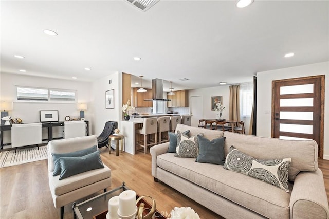 20853 Moonlake St, Diamond Bar, CA 91789 - living area featuring recessed lighting and light wood-style flooring