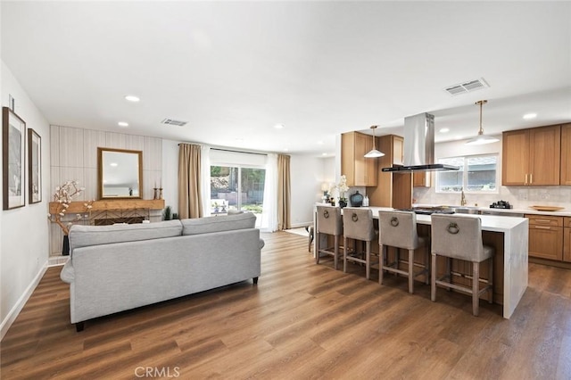 20853 Moonlake St, Diamond Bar, CA 91789 - living room featuring plenty of natural light, dark wood-style floors, recessed lighting, and baseboards