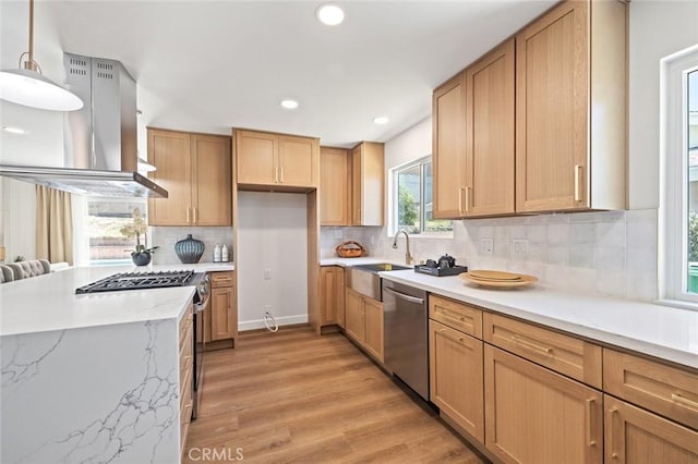 20853 Moonlake St, Diamond Bar, CA 91789 - kitchen featuring a sink, appliances with stainless steel finishes, light wood-type flooring, tasteful backsplash, and light stone countertops