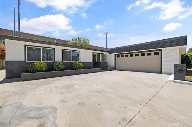 20853 Moonlake St, Diamond Bar, CA 91789 - single story home with brick siding, driveway, a garage, and stucco siding