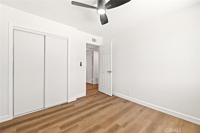 20853 Moonlake St, Diamond Bar, CA 91789 - unfurnished bedroom featuring wood finished floors, a closet, baseboards, and a ceiling fan