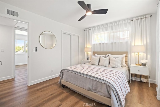 20853 Moonlake St, Diamond Bar, CA 91789 - bedroom with a closet, baseboards, wood finished floors, and a ceiling fan