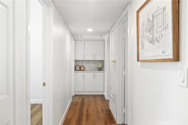 20853 Moonlake St, Diamond Bar, CA 91789 - hallway with dark wood finished floors, attic access, and recessed lighting