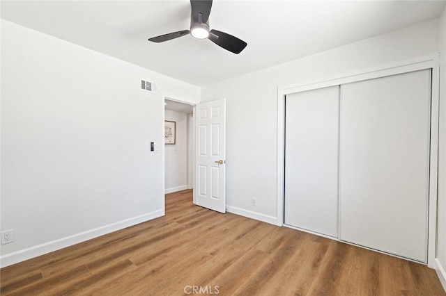 20853 Moonlake St, Diamond Bar, CA 91789 - unfurnished bedroom with wood finished floors, baseboards, a closet, and ceiling fan