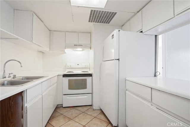 1450 Locust Ave Unit 205, Long Beach, CA 90813 - kitchen with white appliances, a sink, under cabinet range hood, white cabinets, and light tile patterned floors