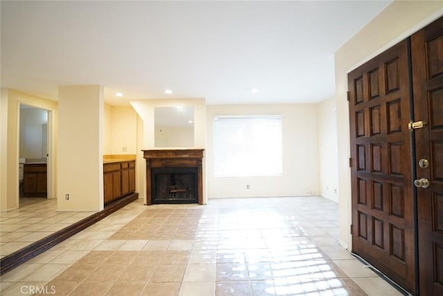 4219 Walnut Grove Ave Unit A, Rosemead, CA 91770 - unfurnished living room featuring a fireplace, light tile patterned floors, and recessed lighting