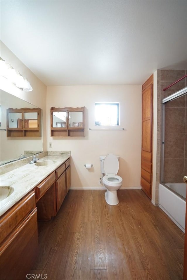 4219 Walnut Grove Ave Unit A, Rosemead, CA 91770 - full bath with double vanity, wood finished floors, and enclosed tub / shower combo