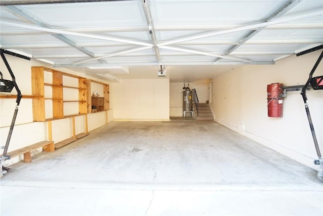 4219 Walnut Grove Ave Unit A, Rosemead, CA 91770 - garage featuring secured water heater and a garage door opener