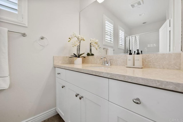 8548 Kristen View Ct, San Diego, CA 92127 - full bath featuring vanity, baseboards, and a shower with curtain