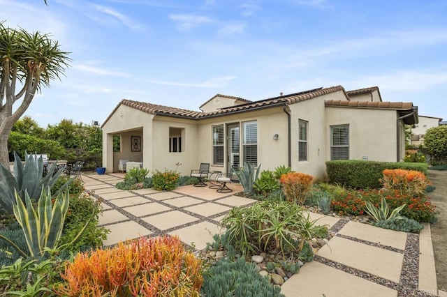 8548 Kristen View Ct, San Diego, CA 92127 - back of property with a patio, a tiled roof, and stucco siding